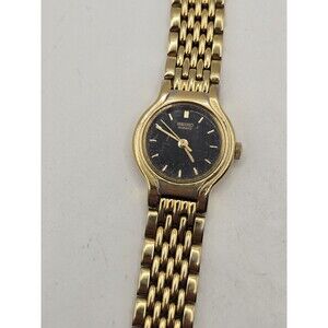 Vintage Seiko Ladies' Black Dial Gold Tone Stainless Steel Watch V401-0289.